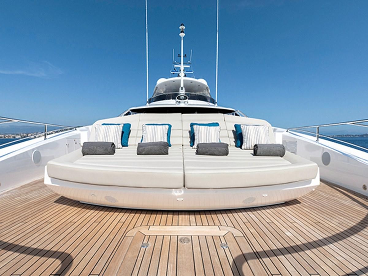 a white boat on a deck aboard ELYSIUM Yacht for Sale