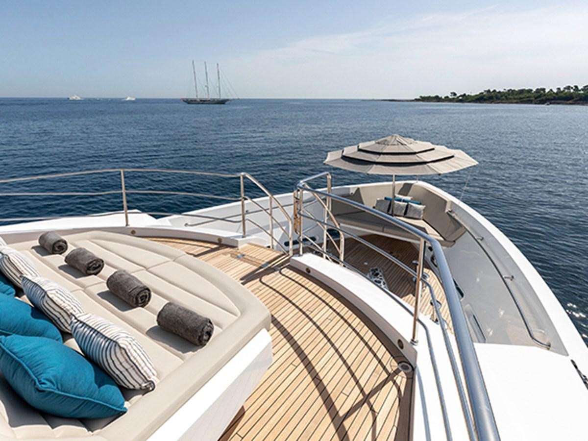 a boat with a canopy on the water aboard ELYSIUM Yacht for Sale