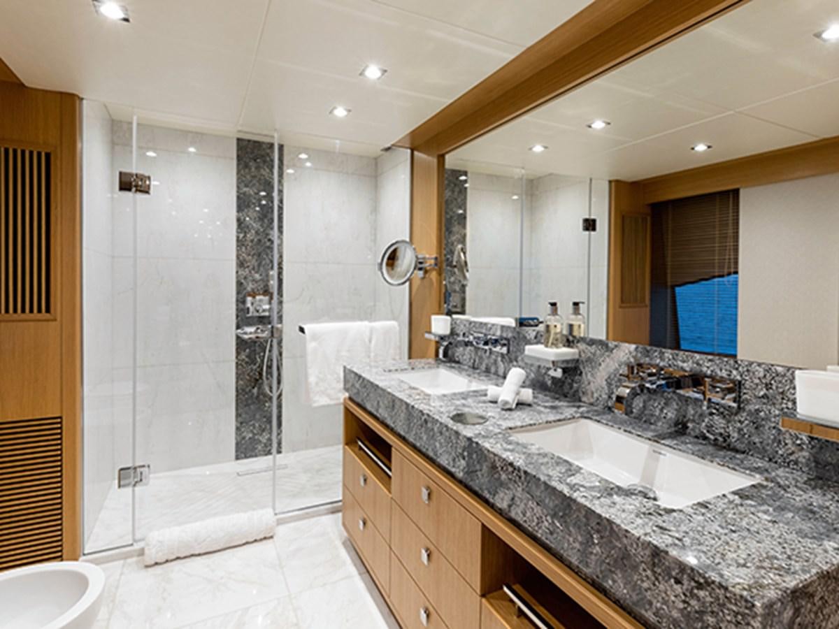 a bathroom with a marble counter top aboard ELYSIUM Yacht for Sale