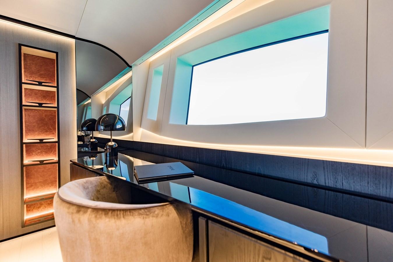 a bathtub with a sink and a chair in a room aboard OFFLINE Yacht for Sale