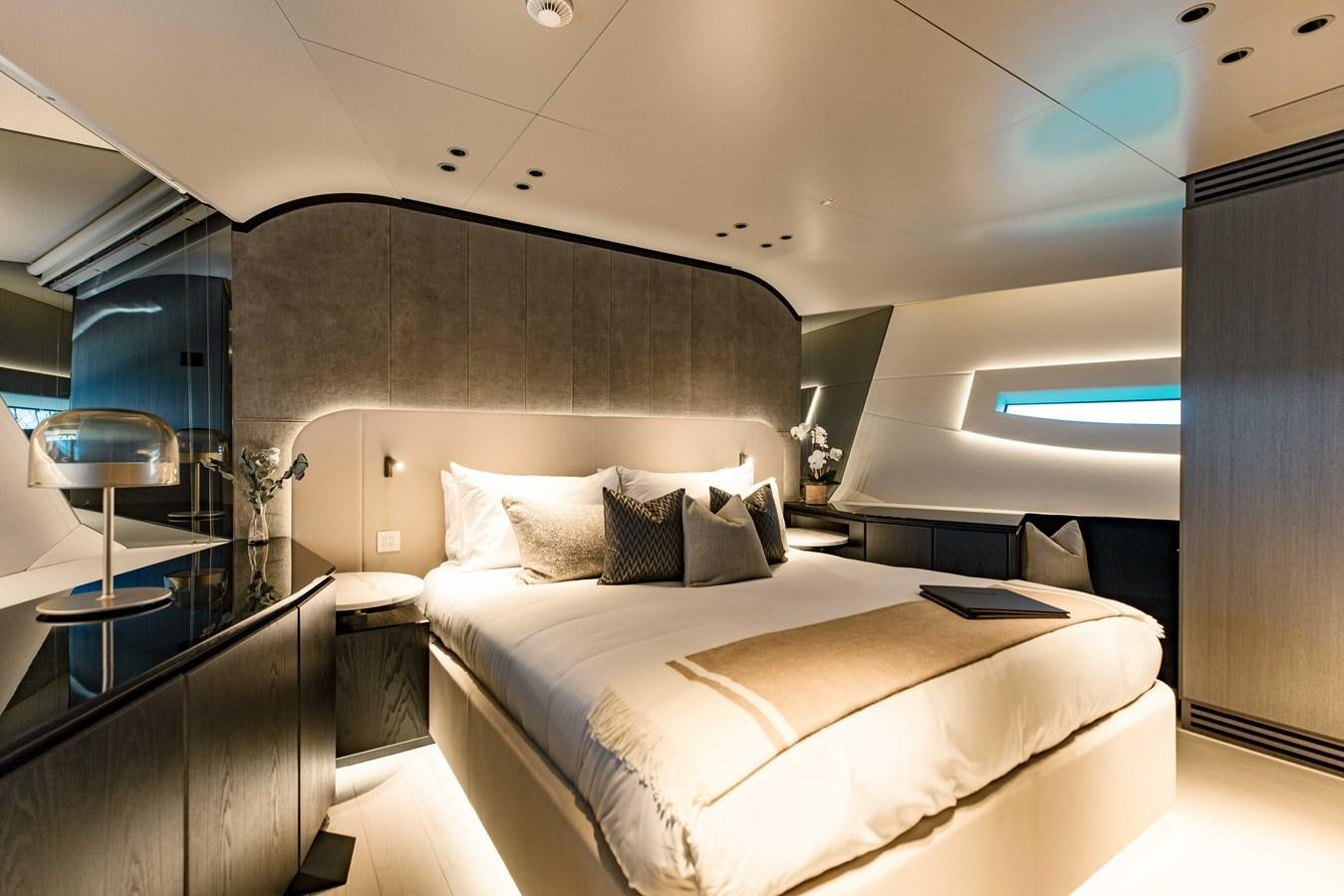 a bed in a room aboard OFFLINE Yacht for Sale