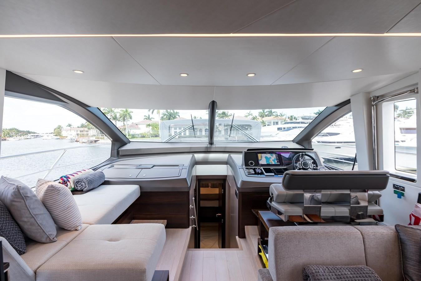 inside of a car aboard NAVAL Yacht for Sale