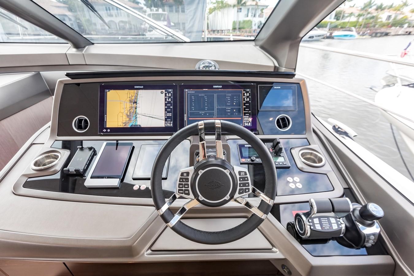 inside of a car aboard NAVAL Yacht for Sale
