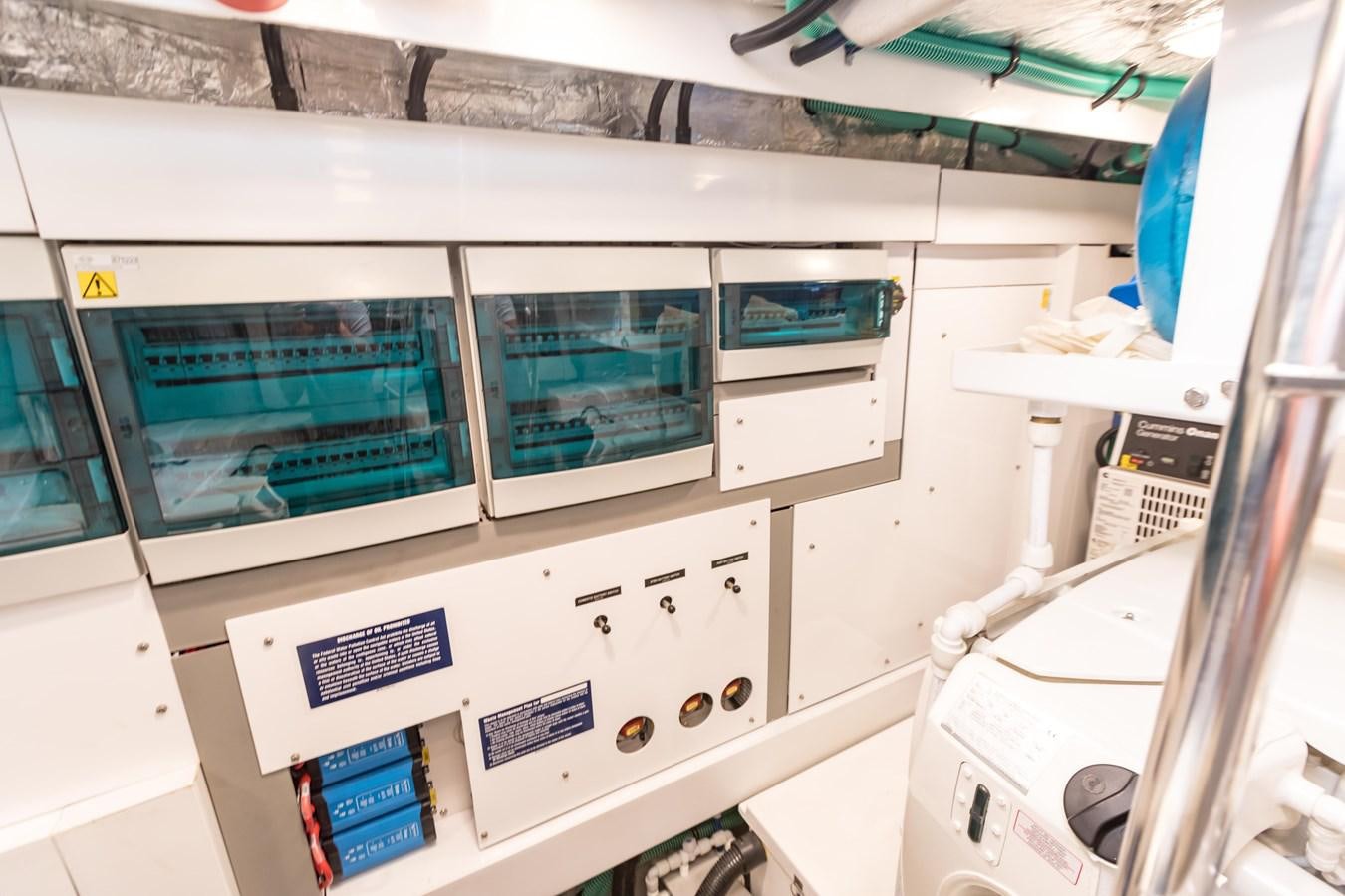 a white machine with black text aboard NAVAL Yacht for Sale