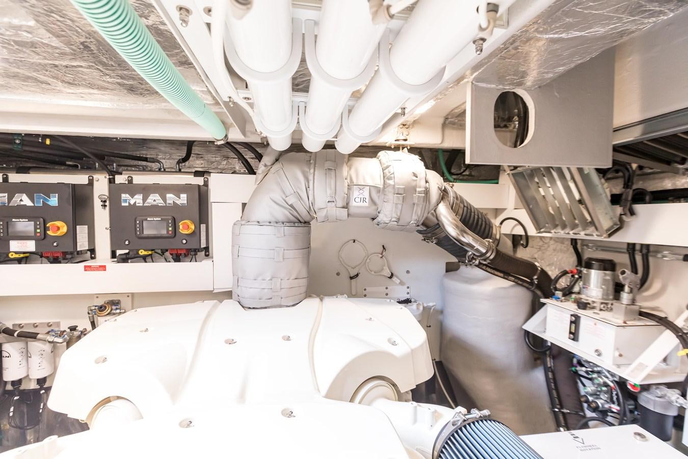 a machine with pipes aboard NAVAL Yacht for Sale