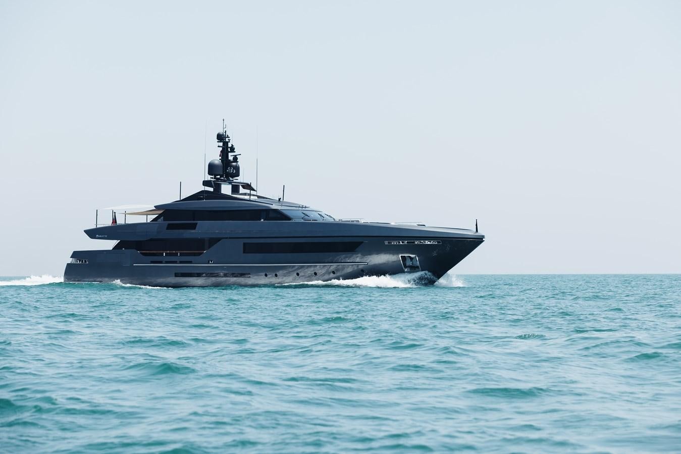 a large ship in the water aboard LUCKY ME Yacht for Sale