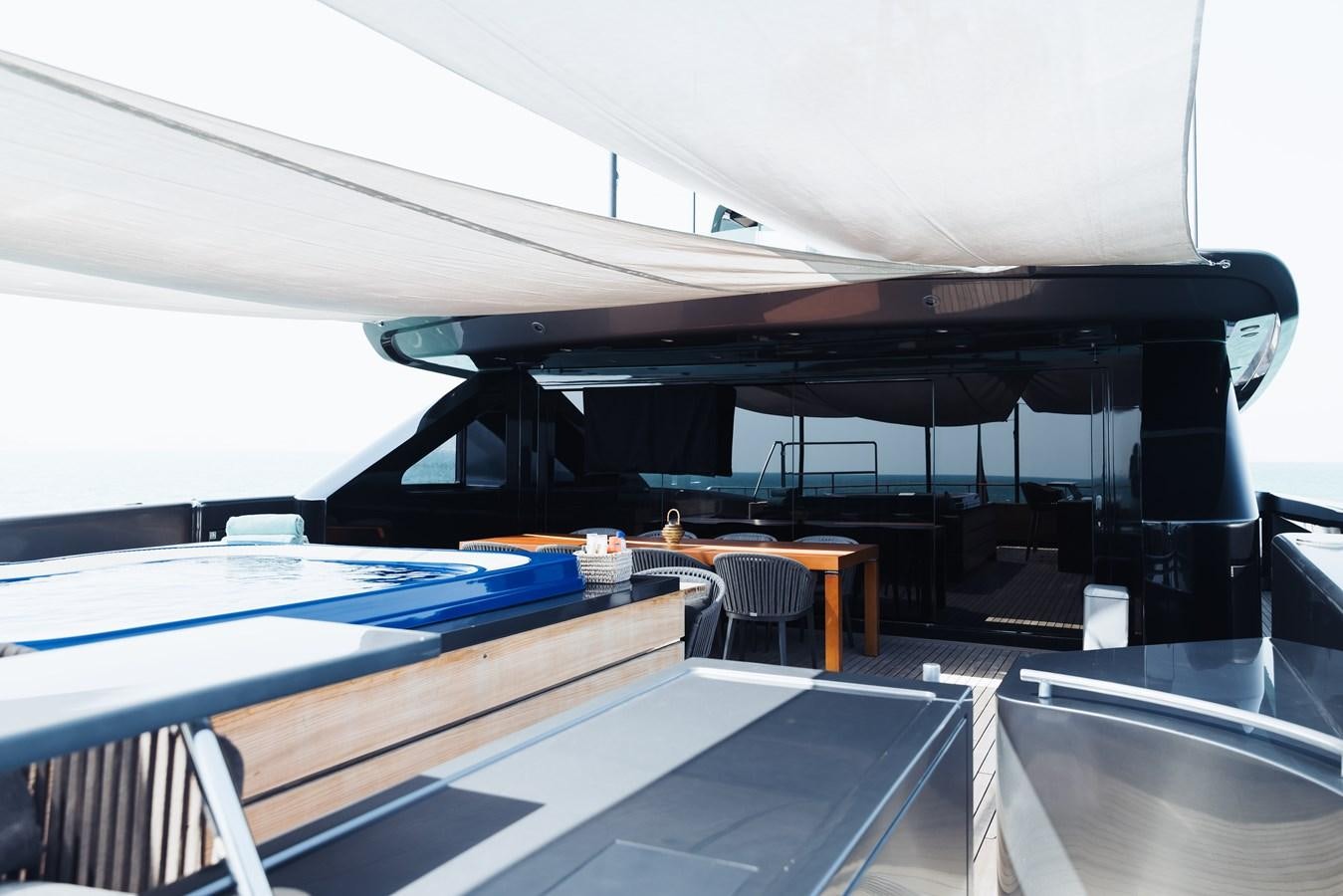 a pool table in a room aboard LUCKY ME Yacht for Sale
