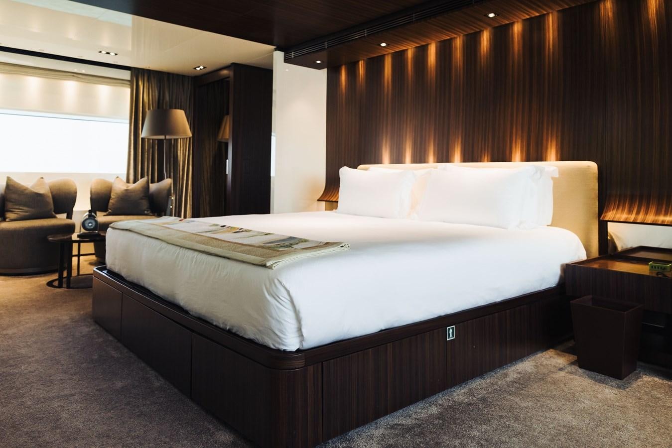 a bed in a hotel room aboard LUCKY ME Yacht for Sale