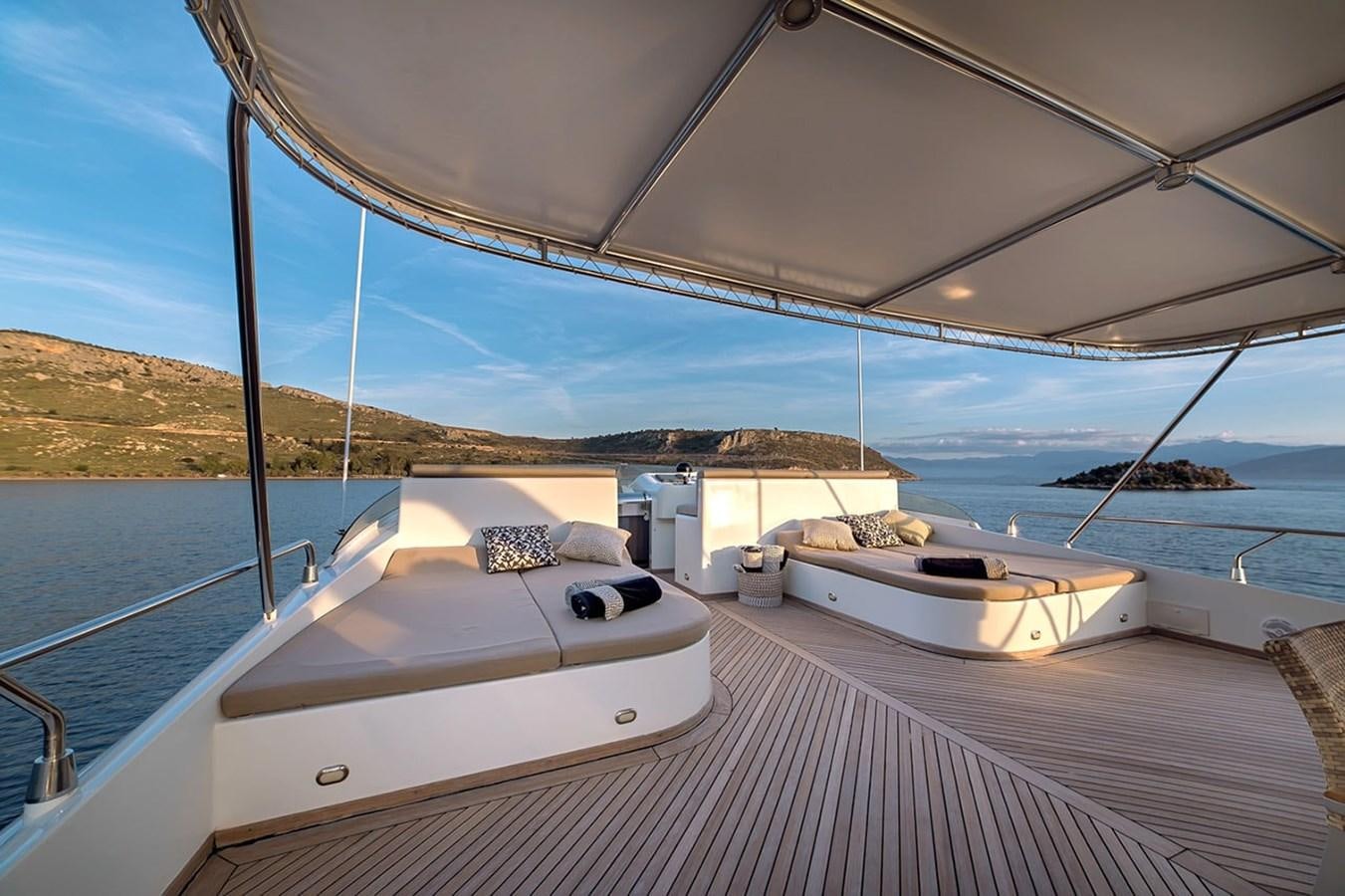a boat on a deck aboard AQUILLA Yacht for Sale