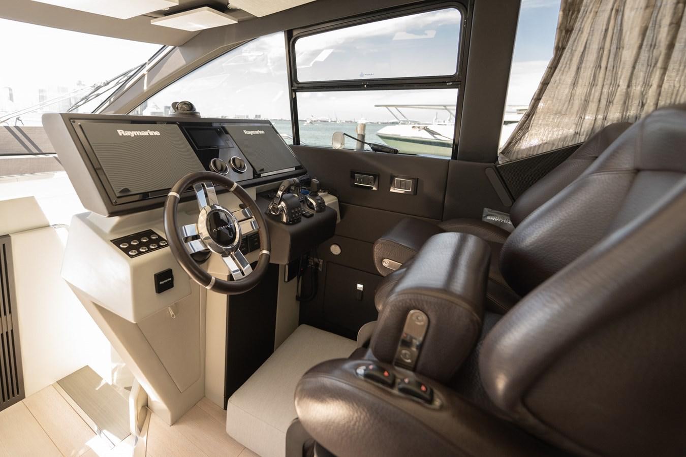 inside of a car aboard CANDELARIA Yacht for Sale
