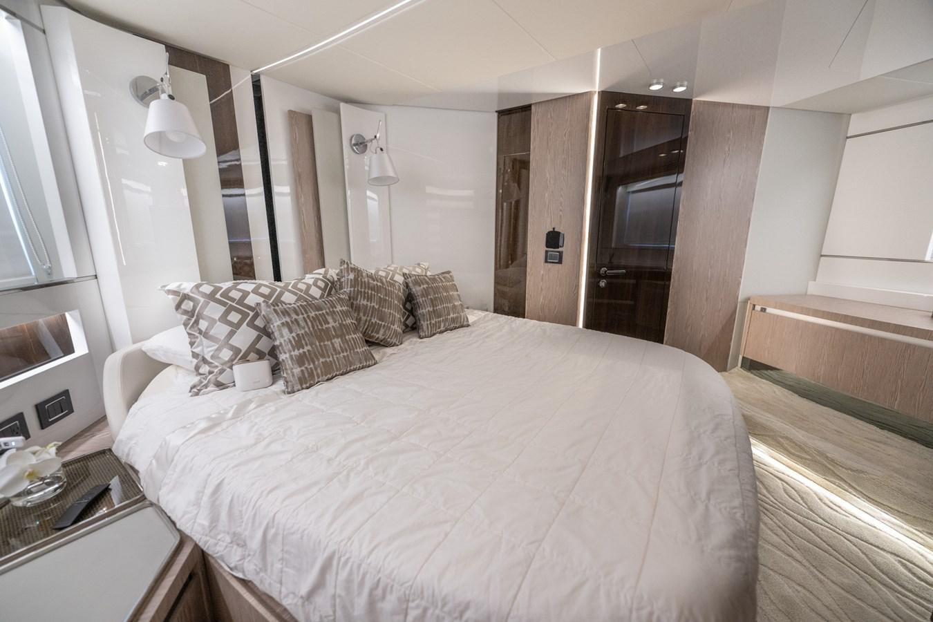 a bed in a room aboard CANDELARIA Yacht for Sale