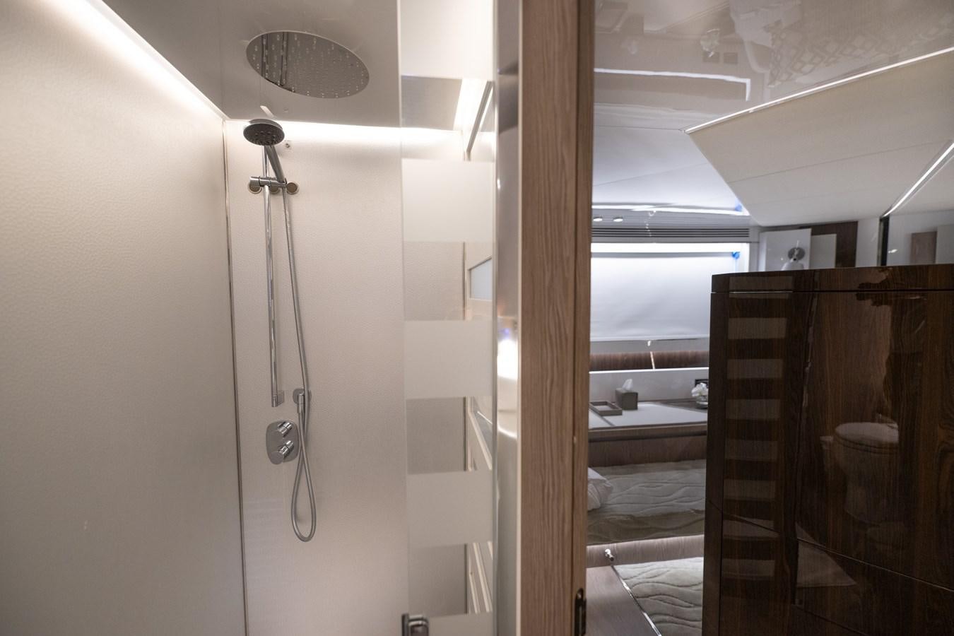 a room with a shower and a sink aboard CANDELARIA Yacht for Sale