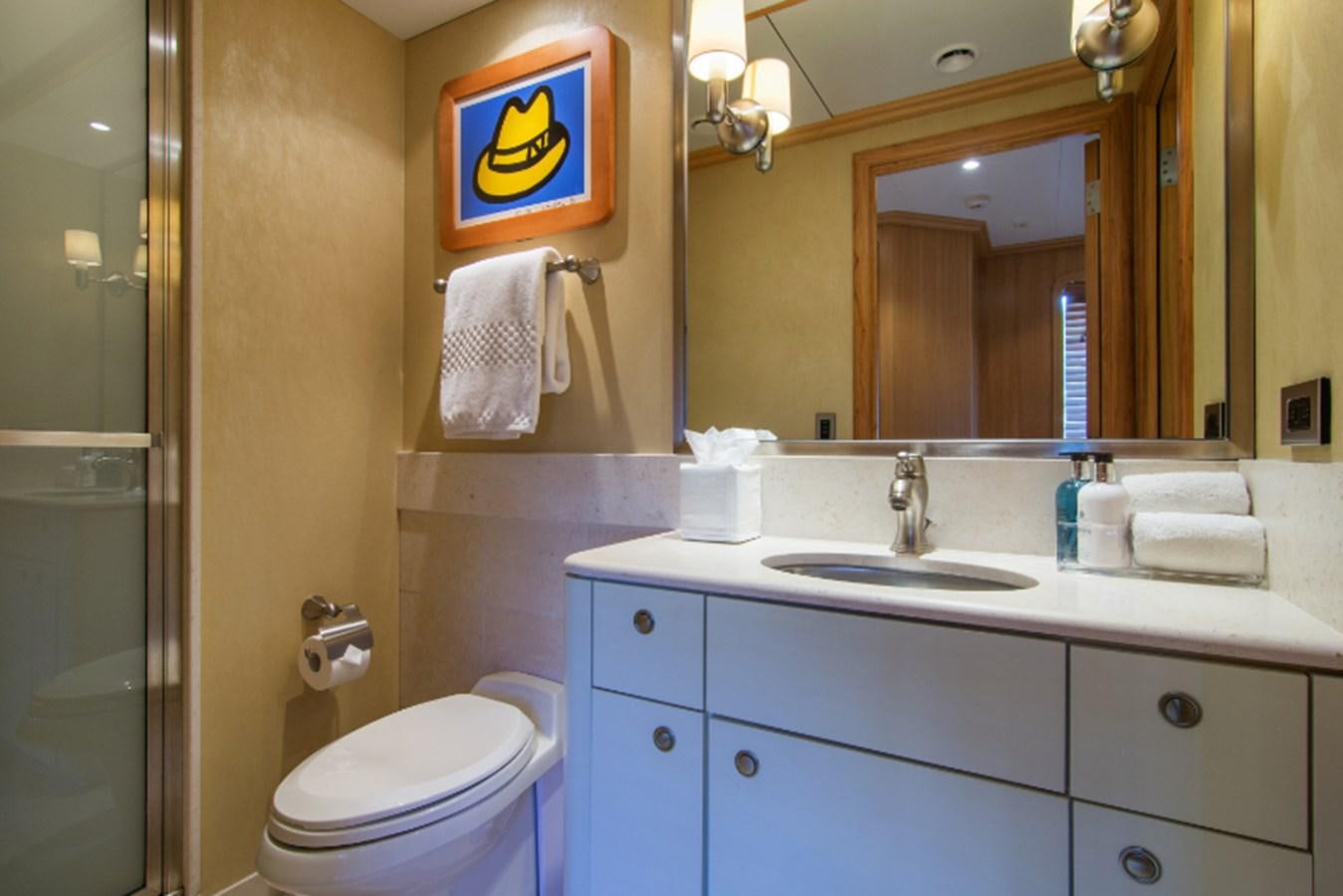 a bathroom with a sink and a toilet aboard 4*PUPPIES Yacht for Sale