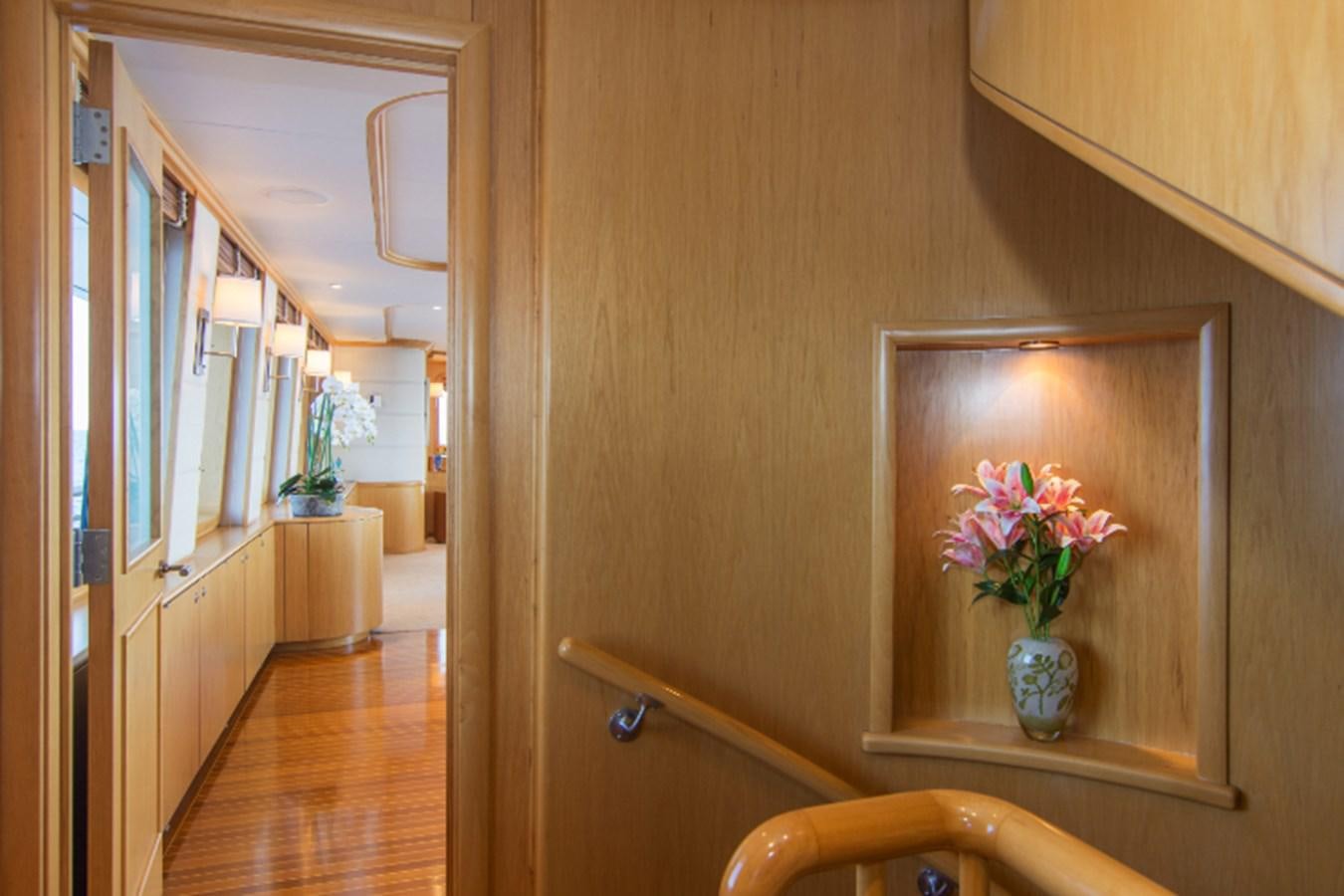 a vase of flowers sits on a table aboard 4*PUPPIES Yacht for Sale