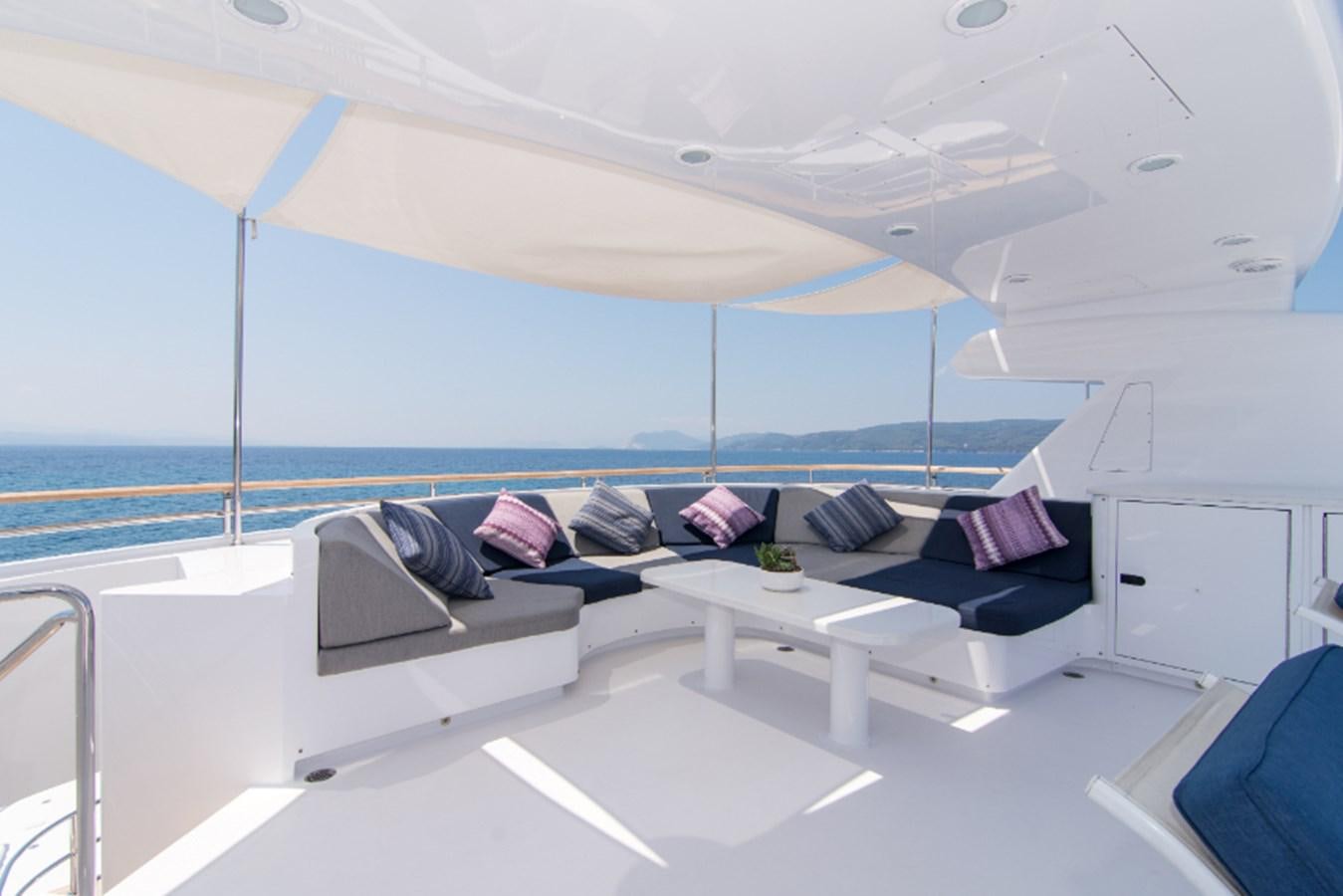 a room with a large window overlooking the ocean aboard 4*PUPPIES Yacht for Sale