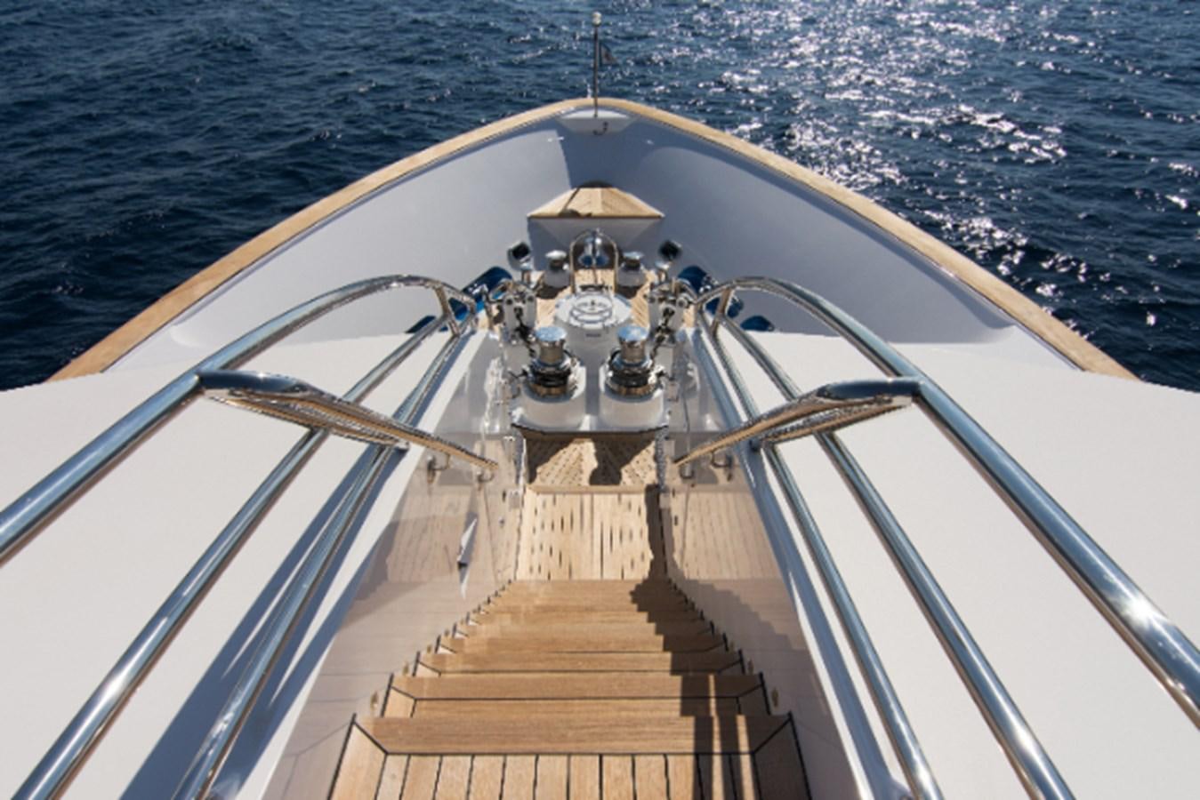 a large white boat with a rope on a body of water aboard 4*PUPPIES Yacht for Sale