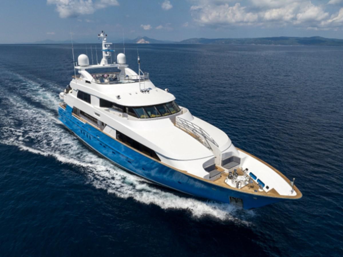 a white boat on the water aboard 4*PUPPIES Yacht for Sale