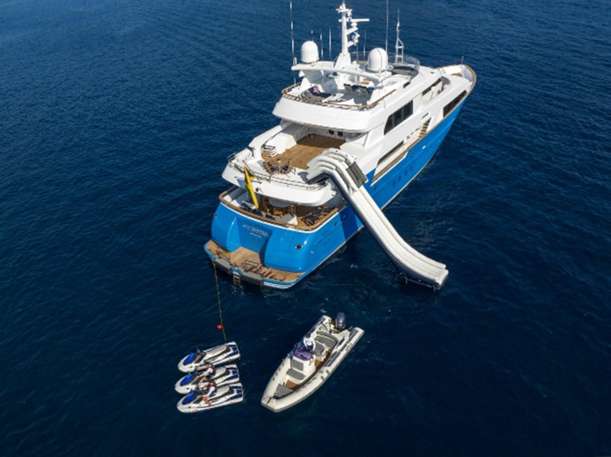 a boat with a large propeller on the water aboard 4*PUPPIES Yacht for Sale