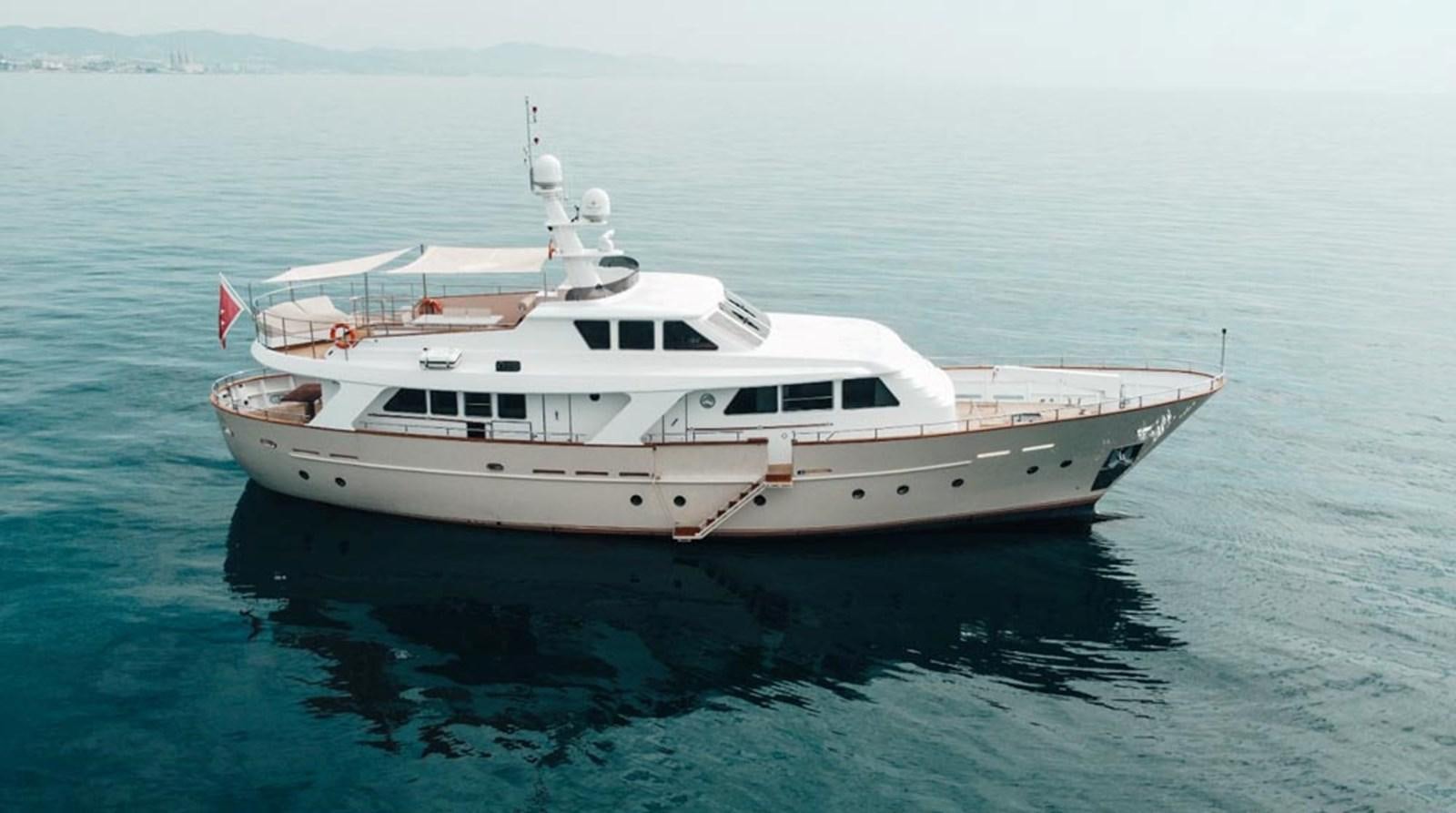 a white boat in the water aboard LAZIZA Yacht for Sale