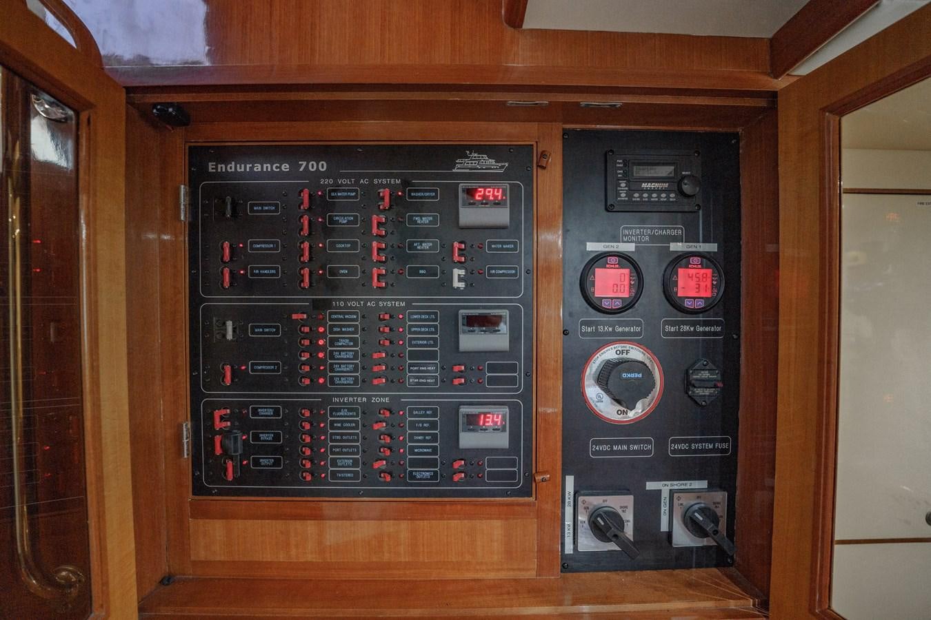 a black electronic device aboard THREE OF A KIND Yacht for Sale