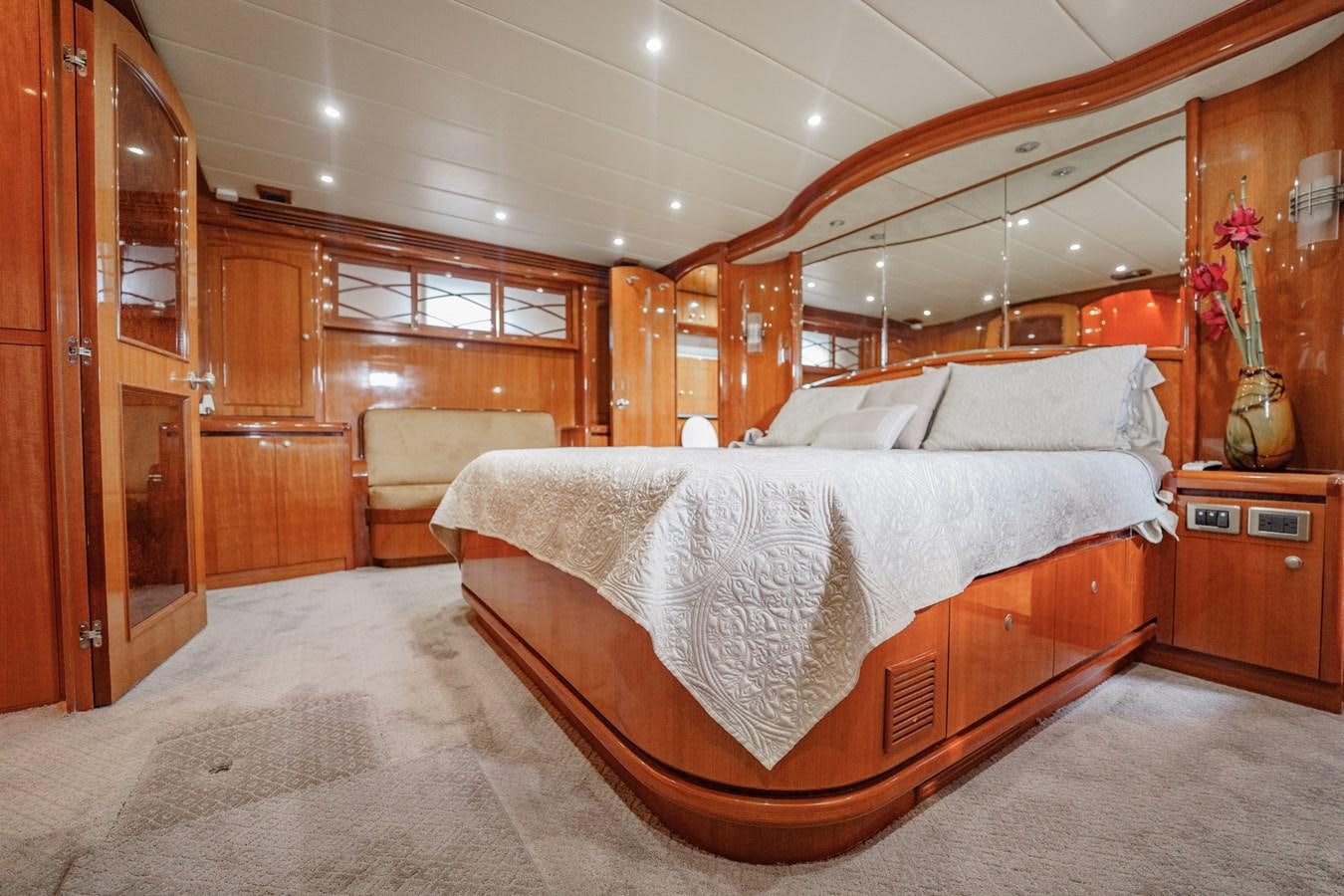 a large bed in a room aboard THREE OF A KIND Yacht for Sale