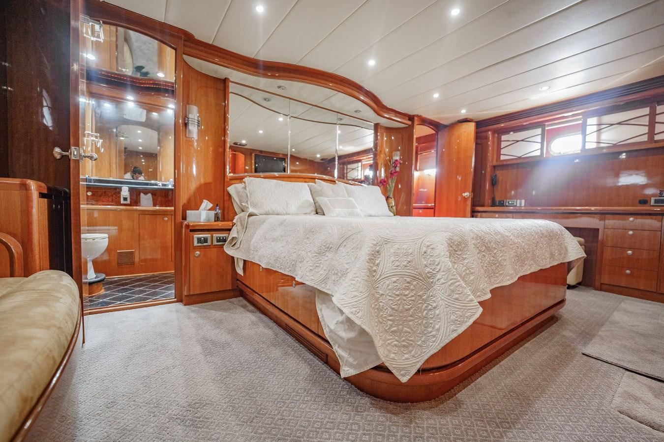 a bed in a room aboard THREE OF A KIND Yacht for Sale