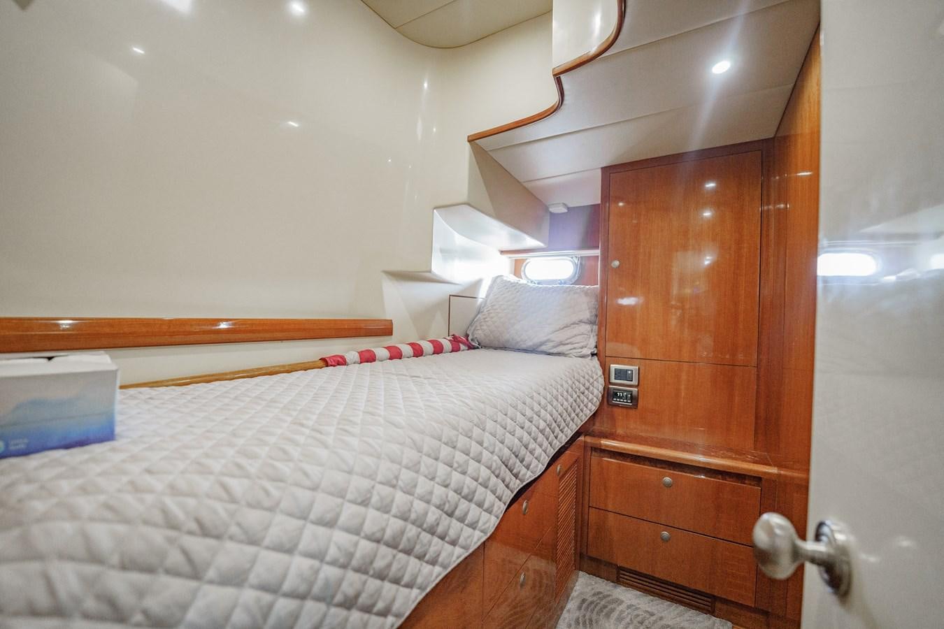 a bed in a room aboard THREE OF A KIND Yacht for Sale