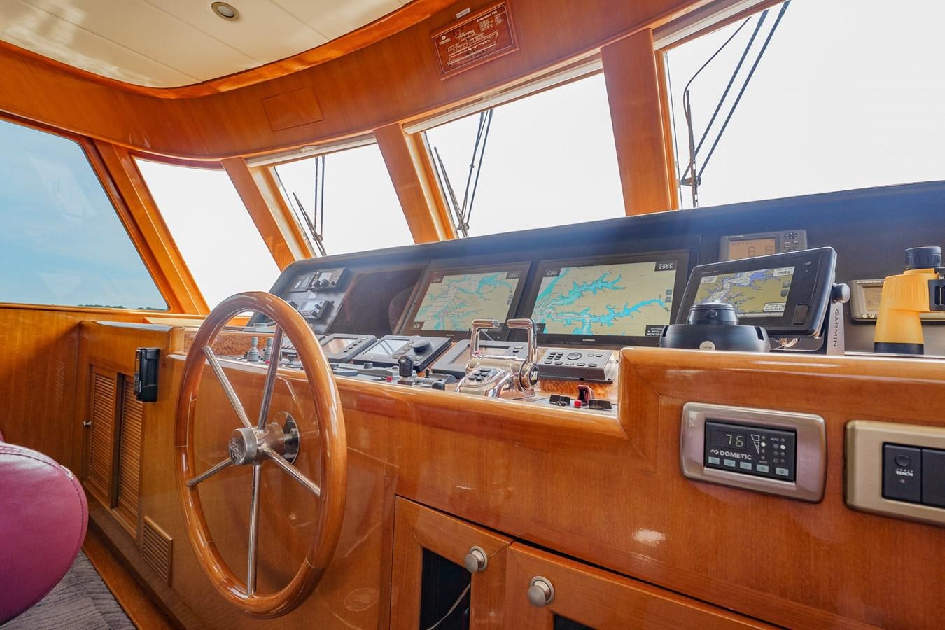 a wooden car with a large display aboard THREE OF A KIND Yacht for Sale