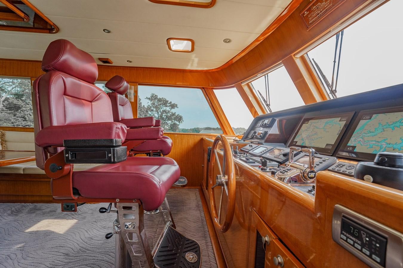 inside of a car aboard THREE OF A KIND Yacht for Sale