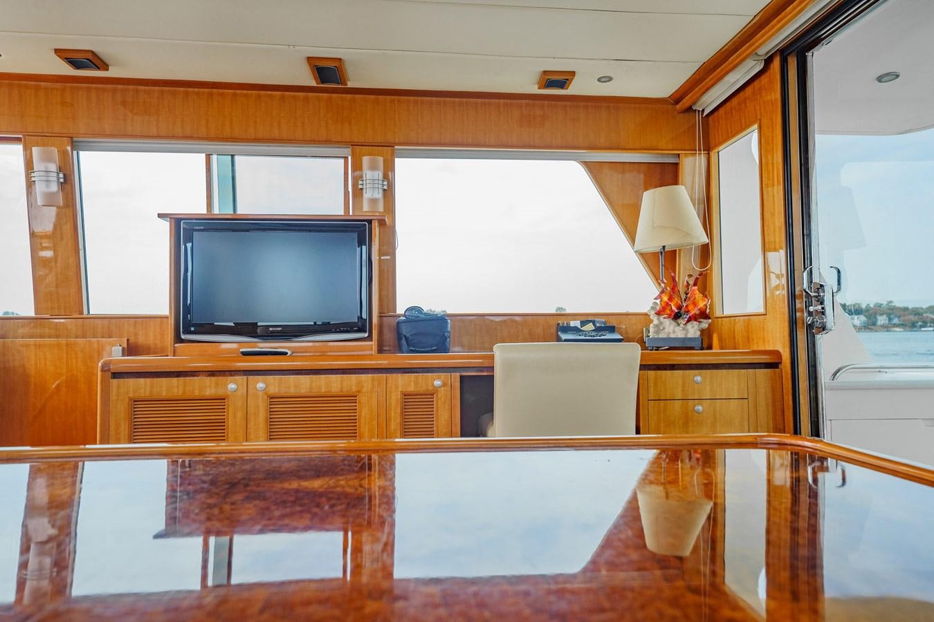 a tv on a counter aboard THREE OF A KIND Yacht for Sale