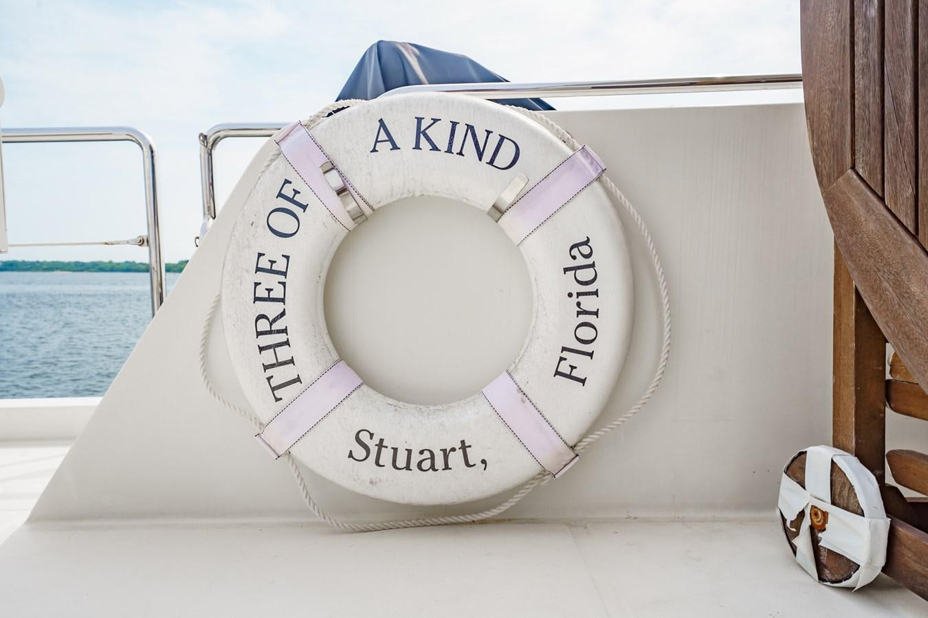 a white record player aboard THREE OF A KIND Yacht for Sale