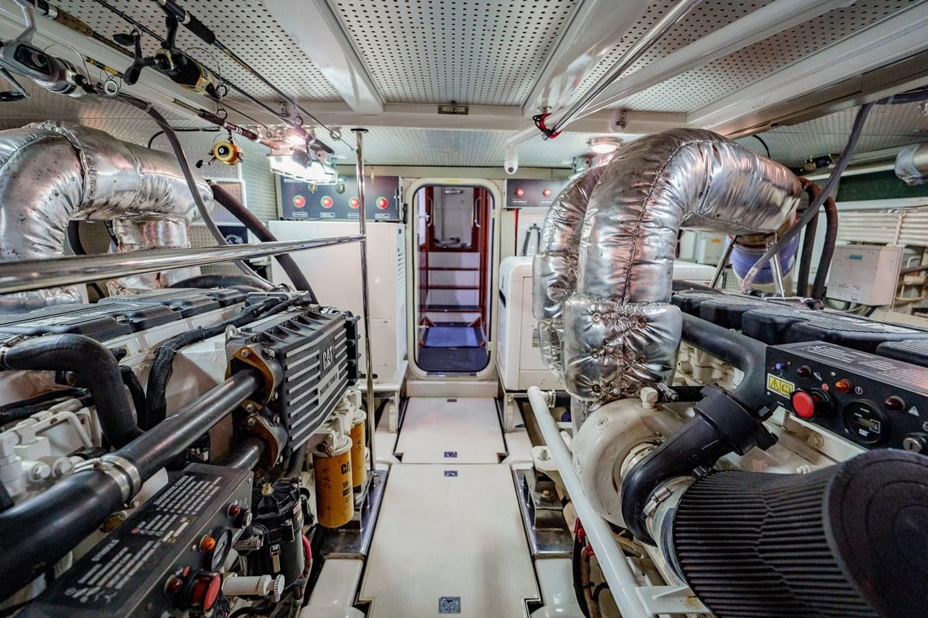 a large metal machine aboard THREE OF A KIND Yacht for Sale