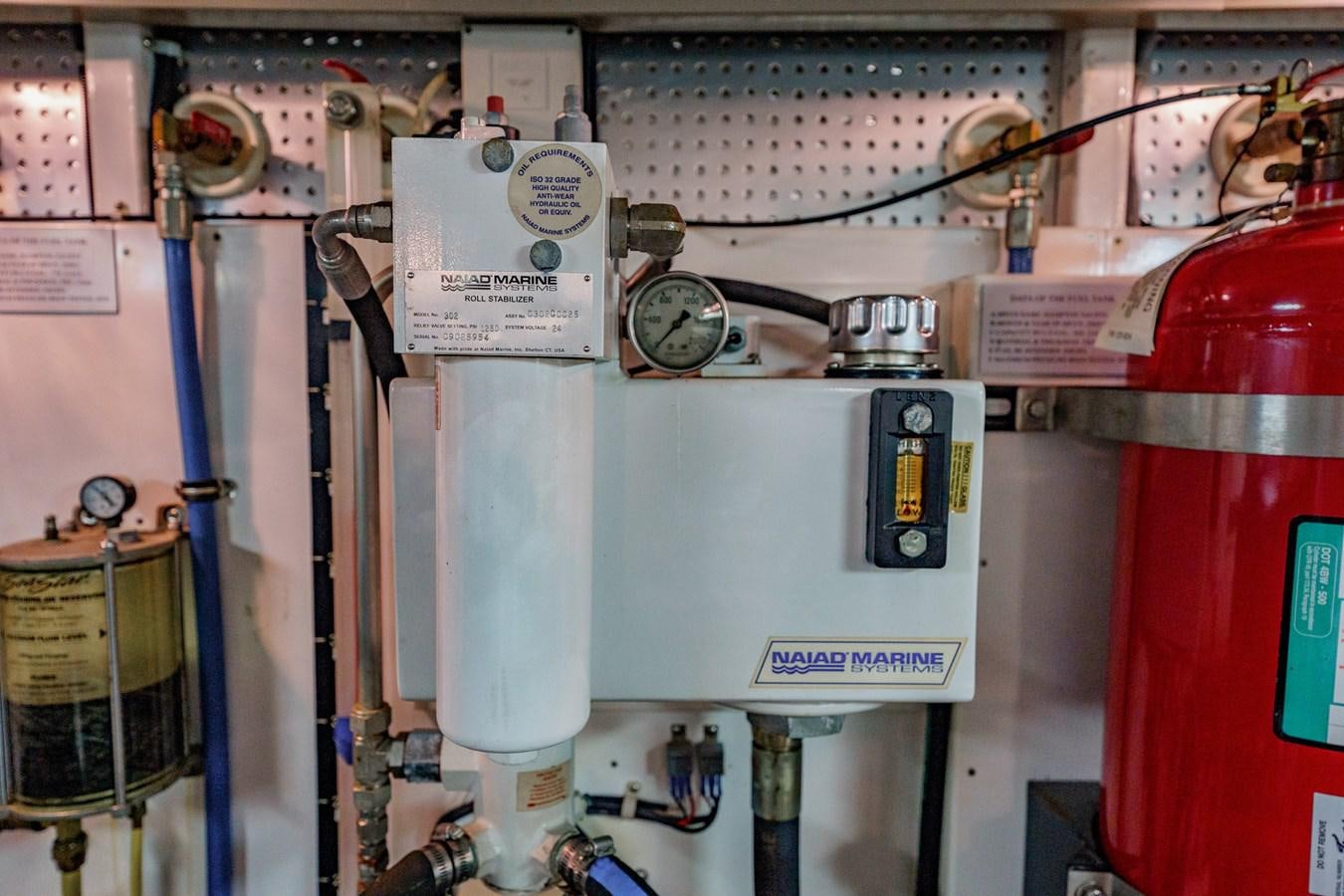 a close-up of a machine aboard THREE OF A KIND Yacht for Sale