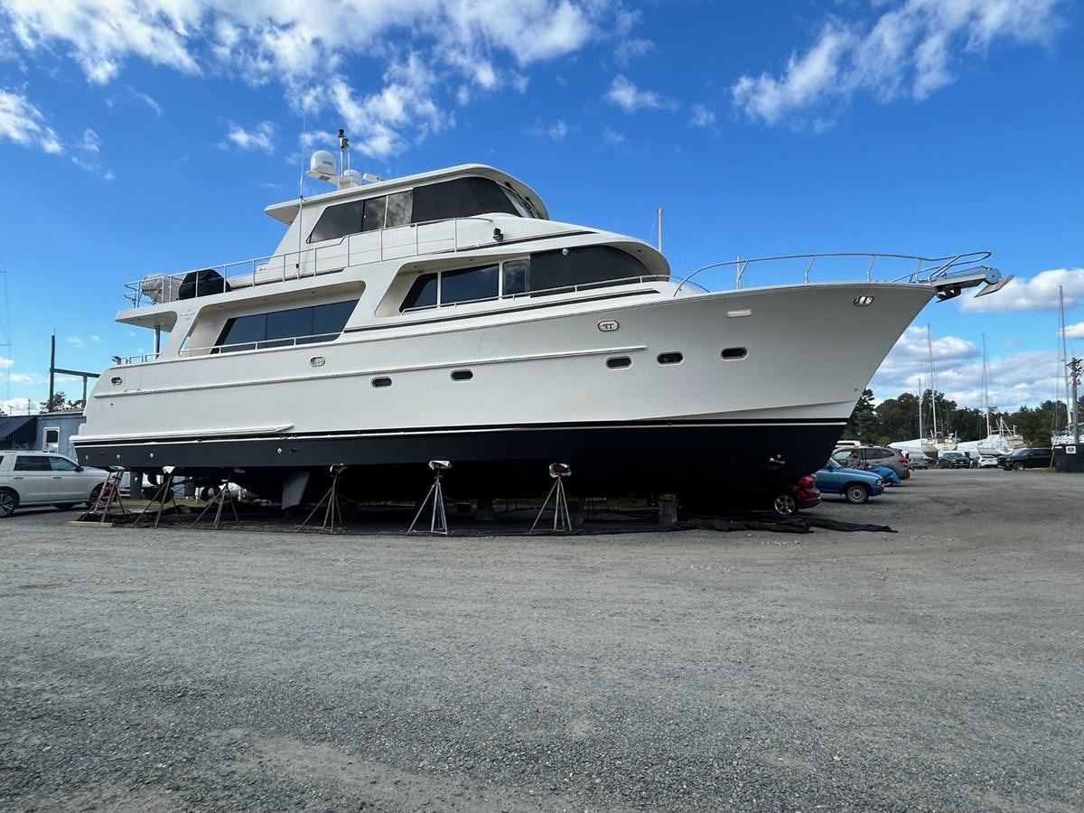 a boat on a trailer aboard THREE OF A KIND Yacht for Sale