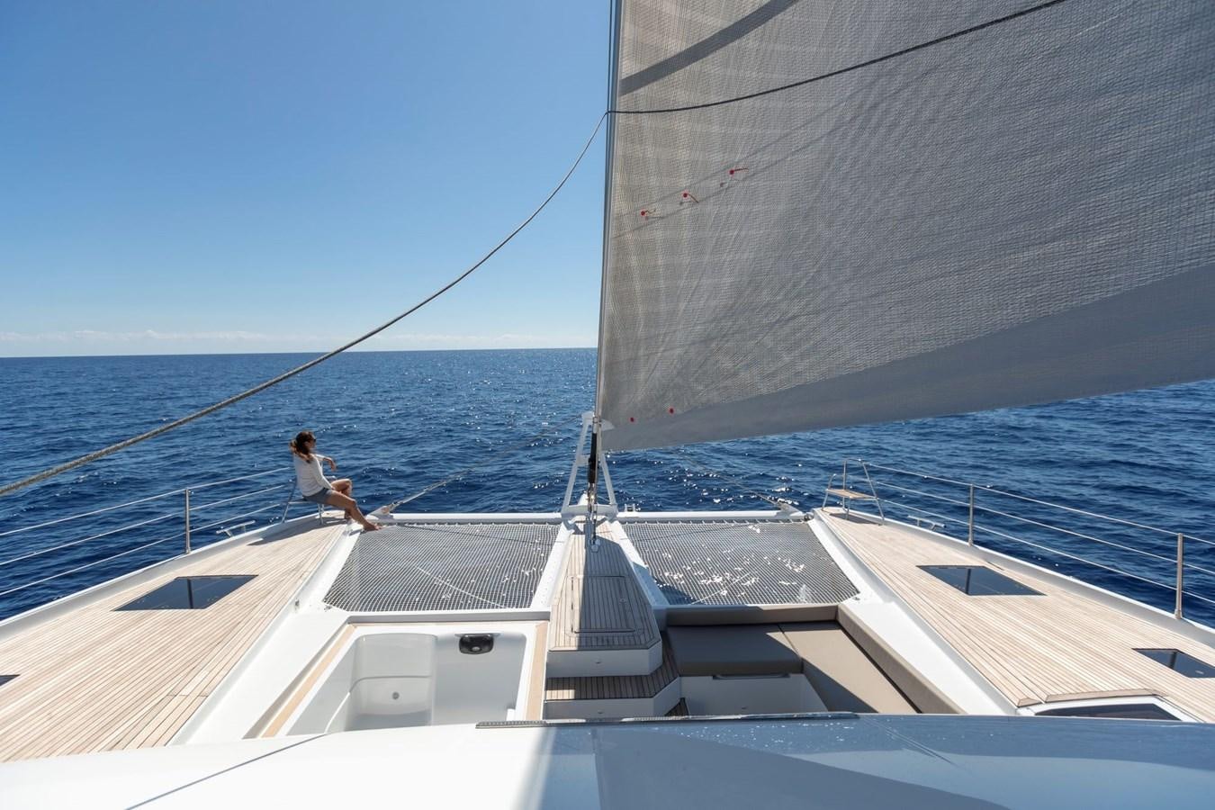 a person sitting on a boat aboard ALEGRIA 67 Yacht for Sale