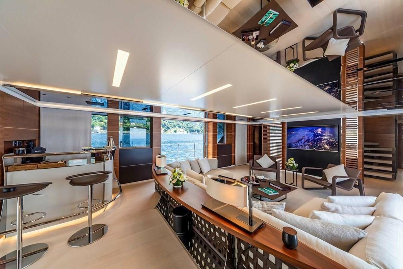 a living room with a large window aboard LADY A Yacht for Sale
