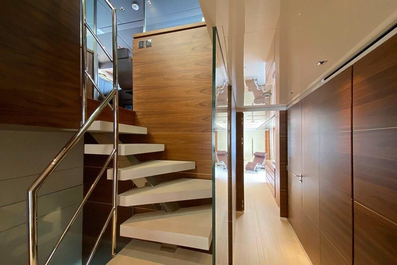 a staircase in a house aboard LADY A Yacht for Sale