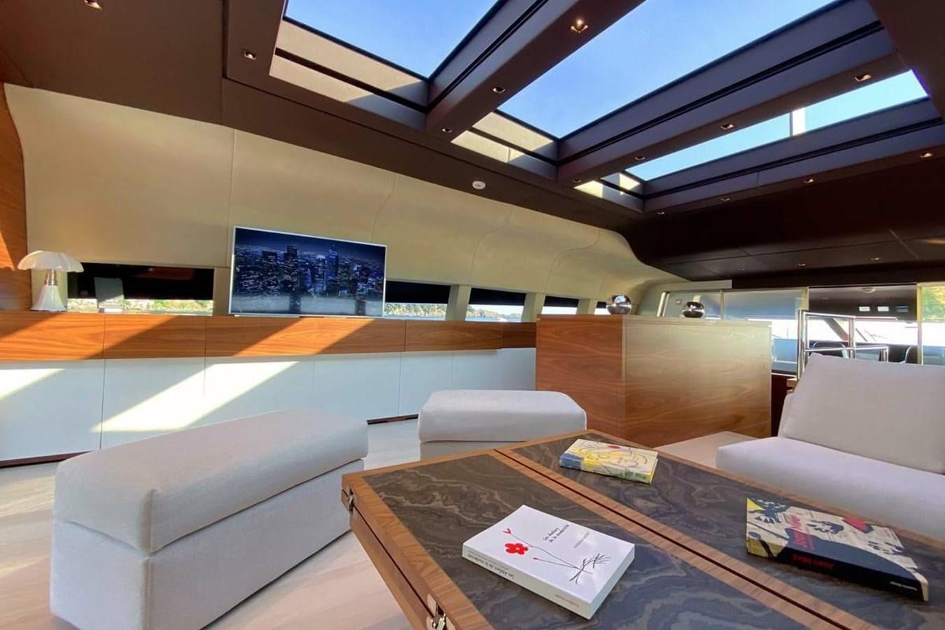 a room with couches and a table aboard LADY A Yacht for Sale