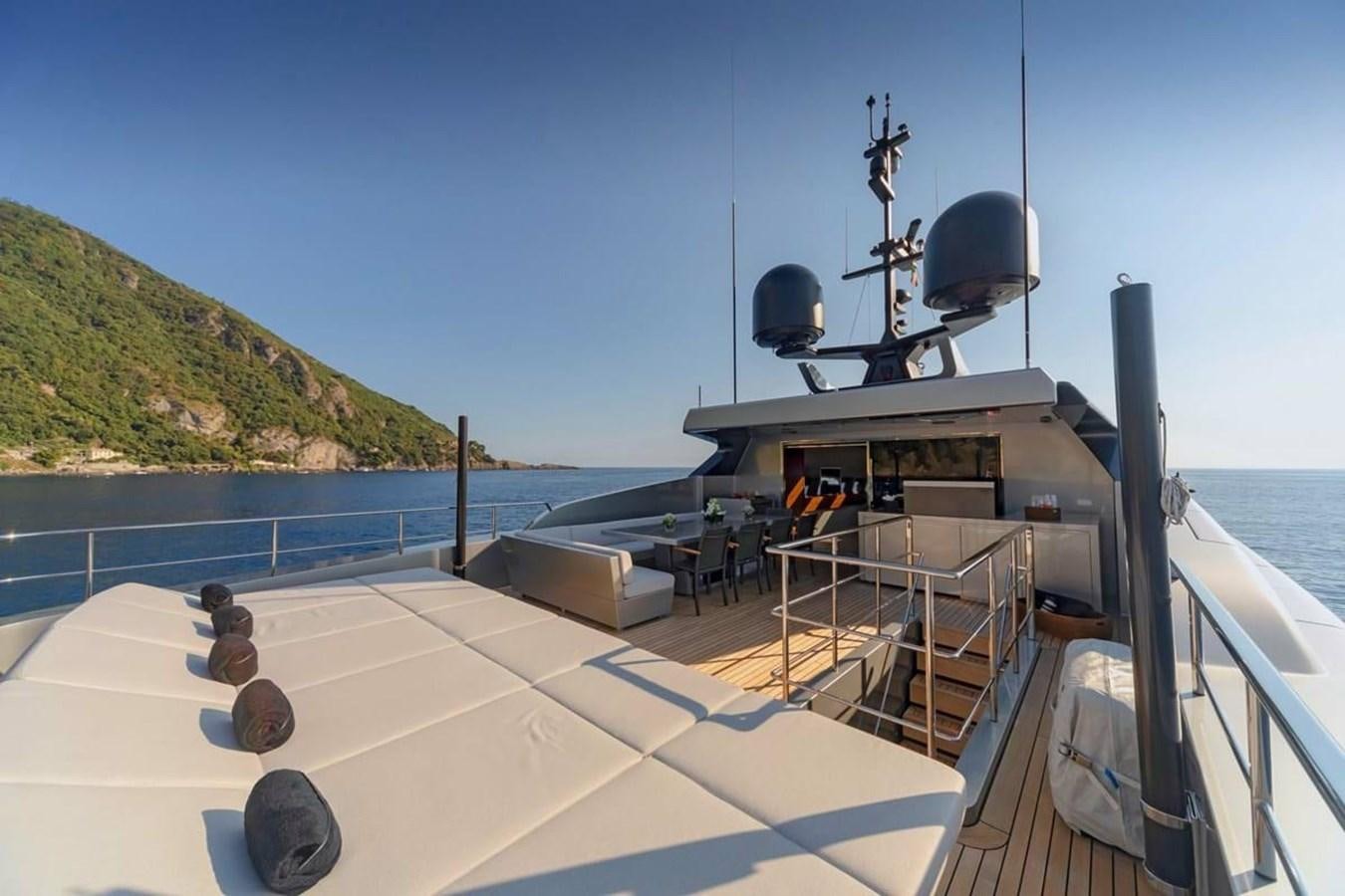a boat with a large machine on the deck aboard LADY A Yacht for Sale