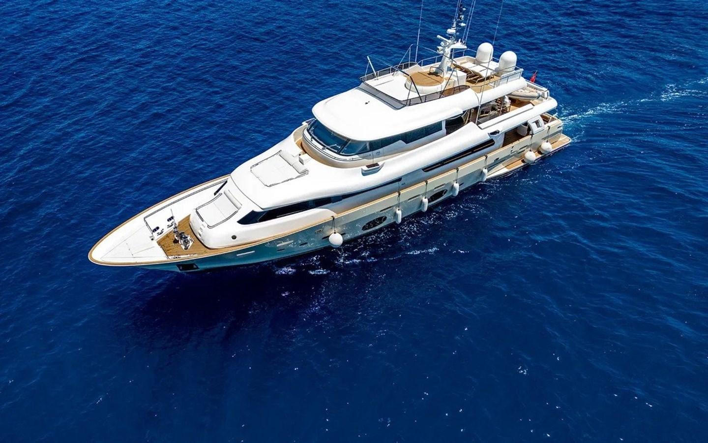 a white boat in the water aboard UNICORN Yacht for Sale