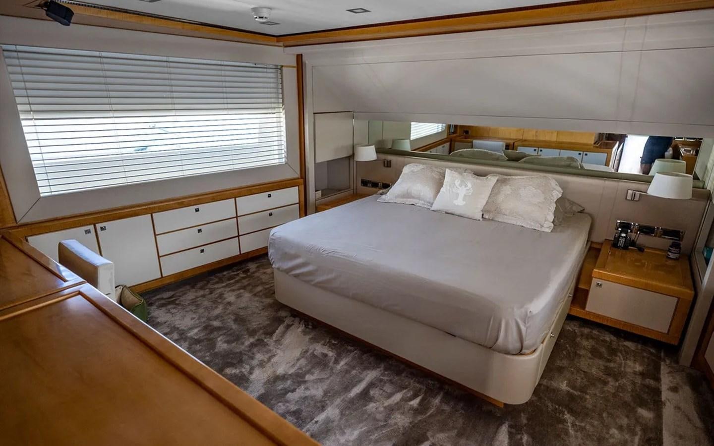 a room with two beds aboard UNICORN Yacht for Sale