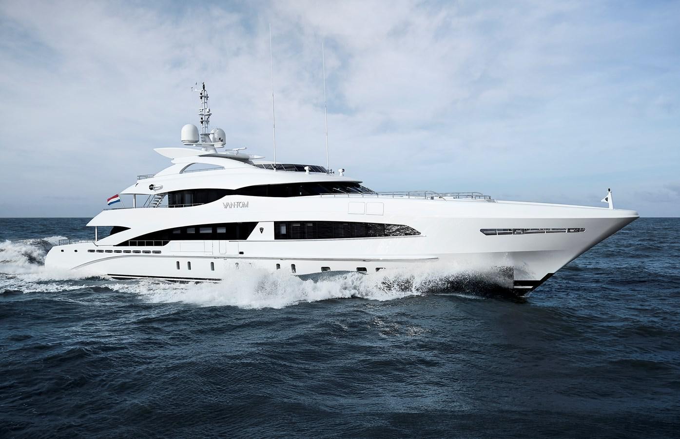 a white yacht on the water aboard VAN TOM Yacht for Sale