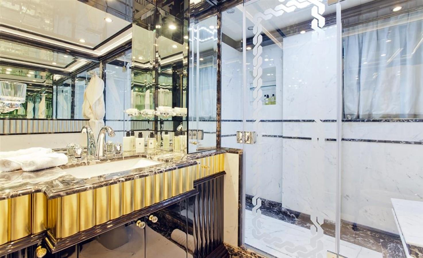 a bathroom with a countertop sink and mirror aboard HOPE & LOVE Yacht for Sale