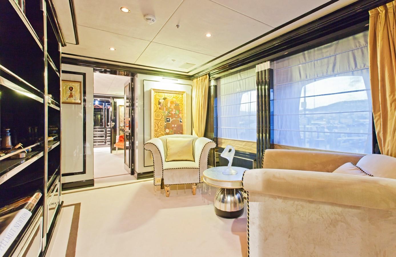 a room with a glass table and chairs and a window aboard HOPE & LOVE Yacht for Sale