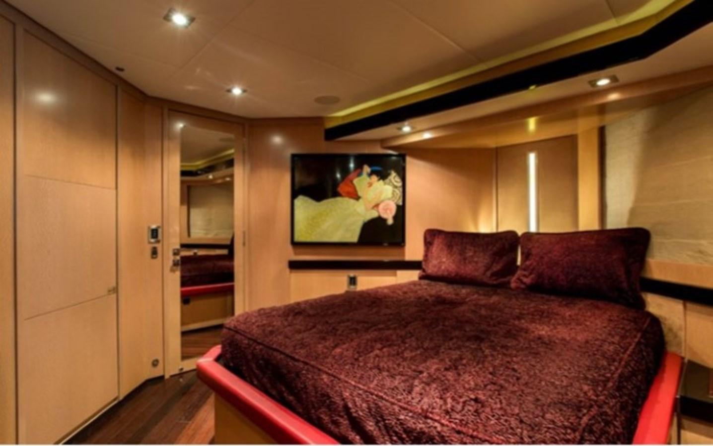a bed in a room aboard MY IZUMI Yacht for Sale