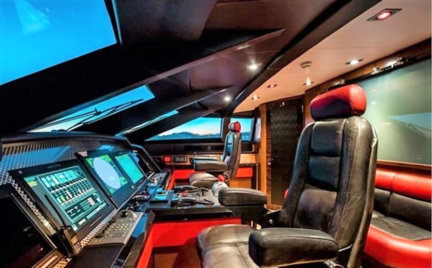 inside of a vehicle with a screen and a computer on the side aboard MY IZUMI Yacht for Sale