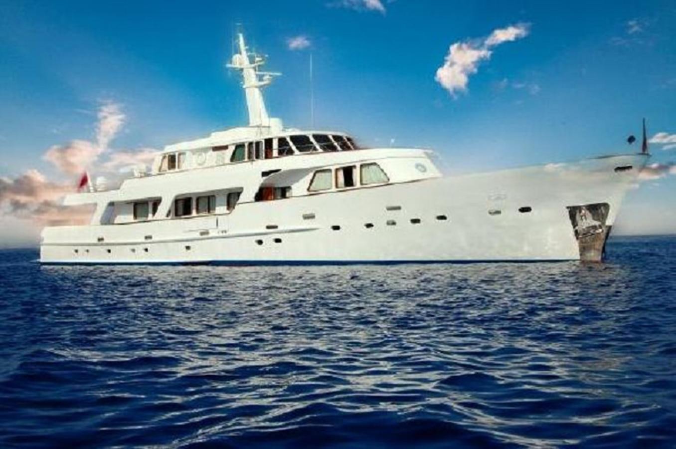 a white boat on the water aboard PATRA Yacht for Sale