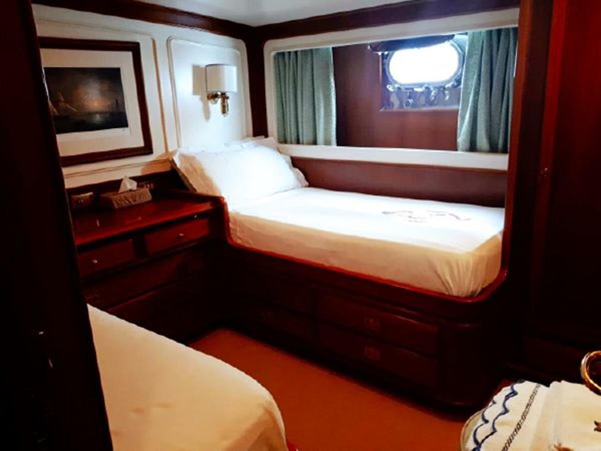 a bed in a room aboard PATRA Yacht for Sale