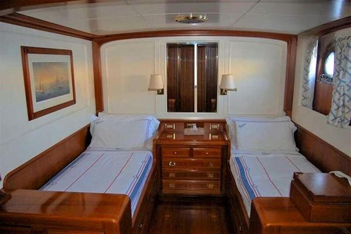a room with two beds aboard PATRA Yacht for Sale