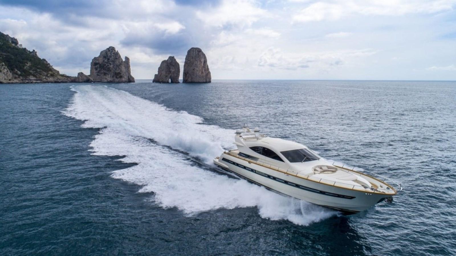 a white car driving on a body of water aboard MIDNIGHT MADNESS Yacht for Sale
